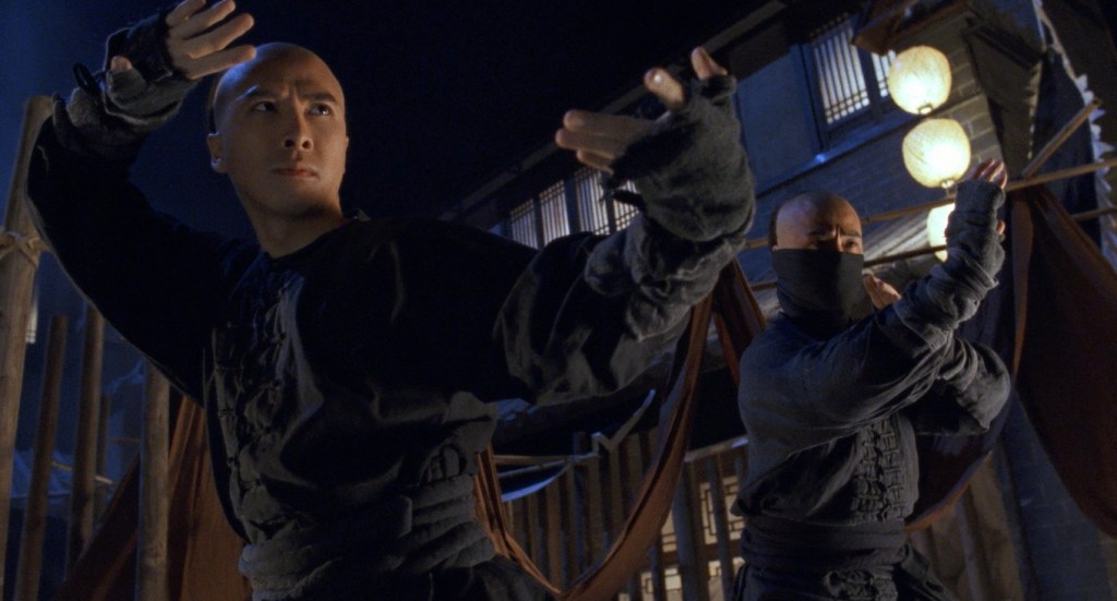 Donnie Yen and Yu Rongguang in character as Wong Kei-Ying and Iron Monkey (a.k.a. doctor Yang) adopting a fighting stance. 